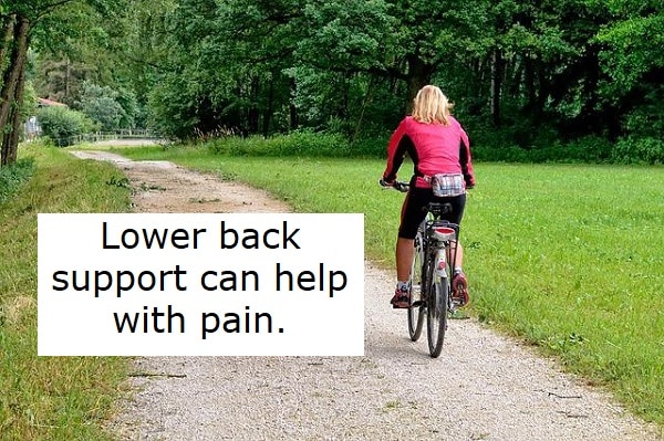 lower back support can help with pain - Woman riding a bike