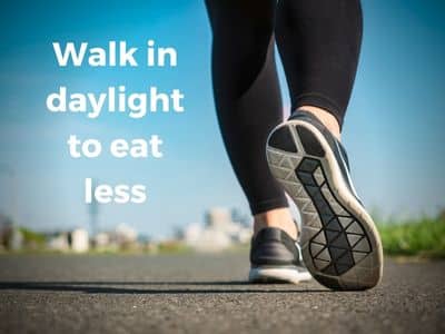 Walk in daylight to eat less