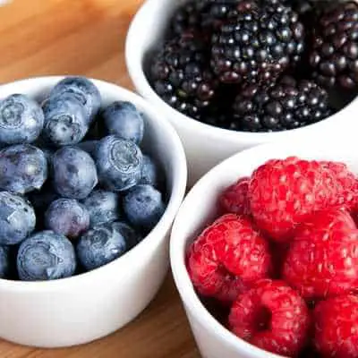 bowls of berries - strawberries, blueberries, raspberries