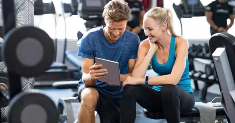 personal trainer working with a client. ACE Personal Training Certification. Is it worth it?