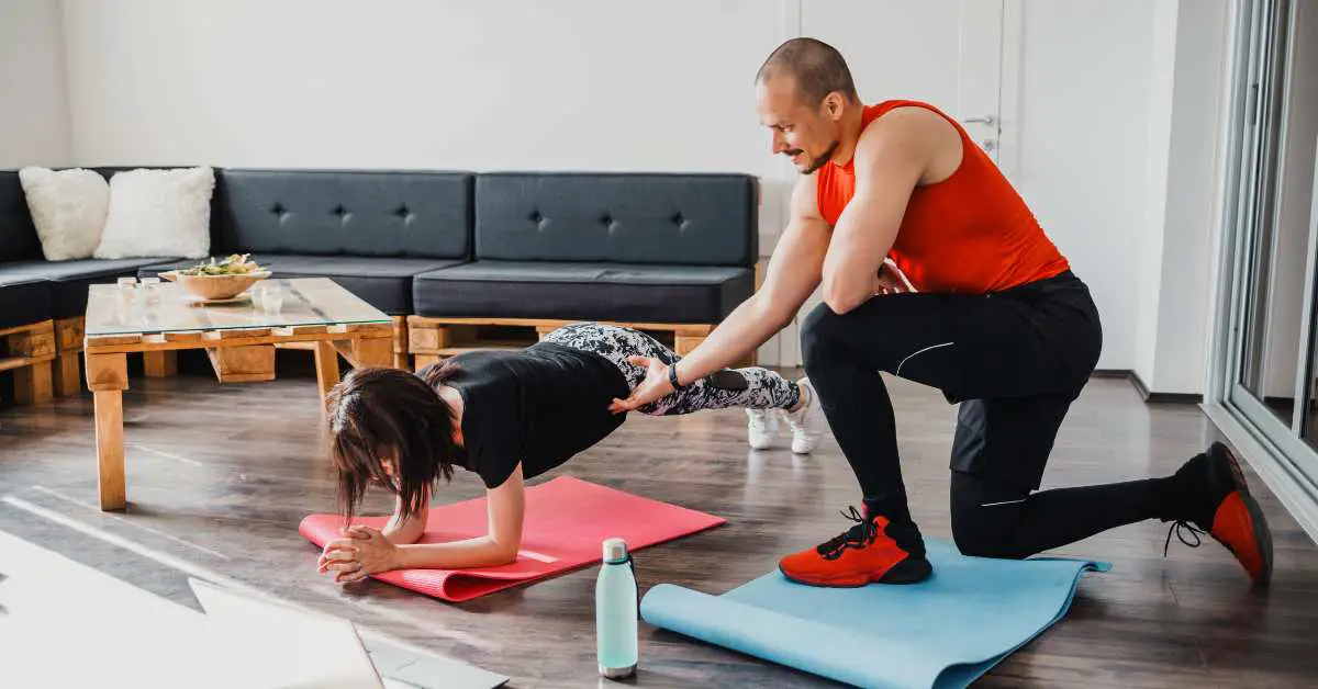 personal trainer working with client in their home. In-Home Personal Training The Ultimate Guide