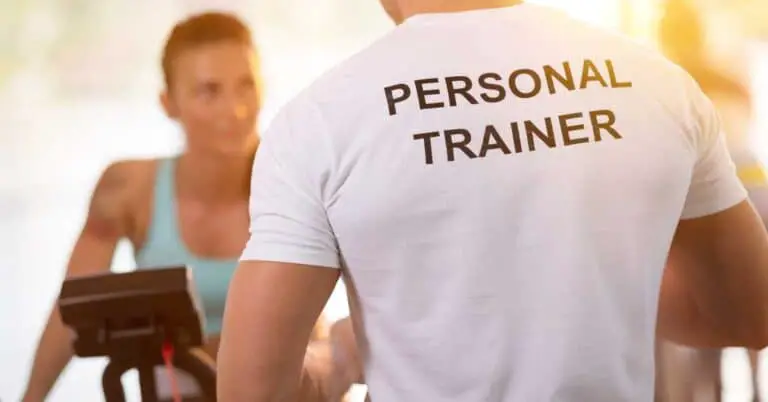 Personal trainer working with a client. Liability Insurance for Personal Trainers
