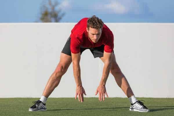 athlete demonstrating bum exercises to get a bigger bum. 