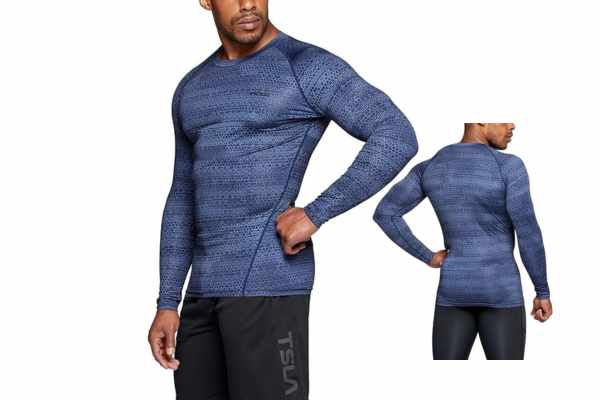 model wearing a long sleeve athletic build shirt. front and back view