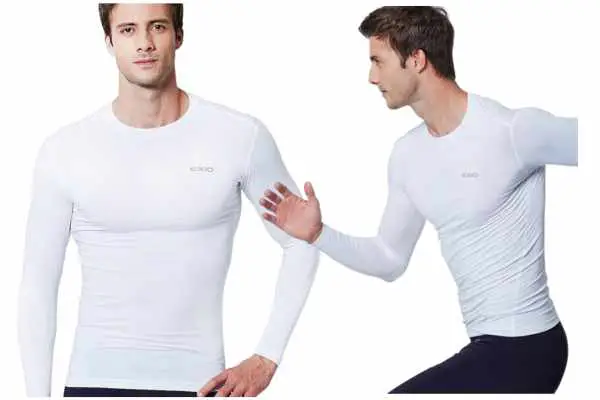 Athlete wearing a Lycra compression shirt. Lycra can stretch up to five times its normal size and still go back to its original shape. This makes it different from most other fabrics and super useful for clothes that need to fit tightly and flexibly around our bodies.