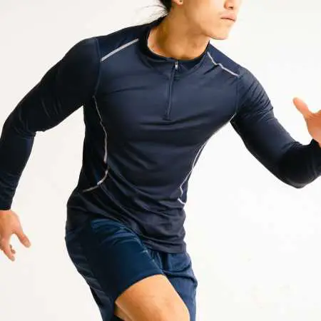 Man exercising with long sleeve tops and shorts