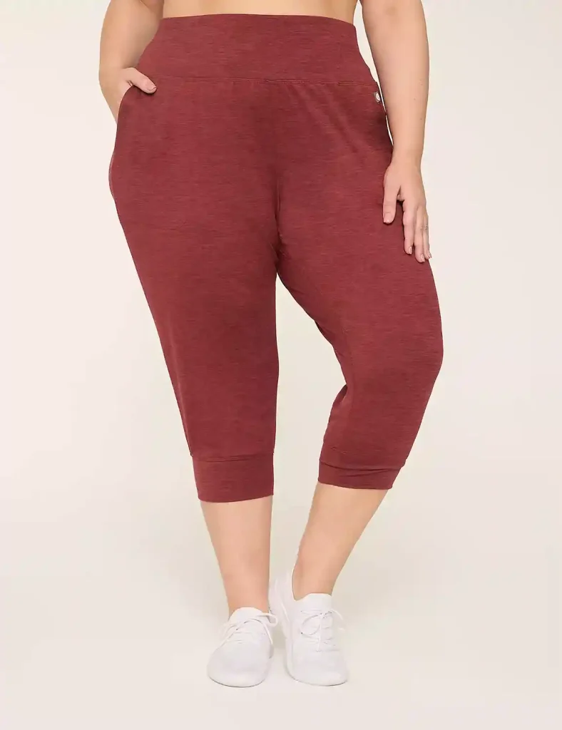 16 Best Workout Leggings for Plus Size Women Over 50 (2025) 16 Model wearing Lane Bryant LIVI Active Cooling No-Roll Waist Leggings.