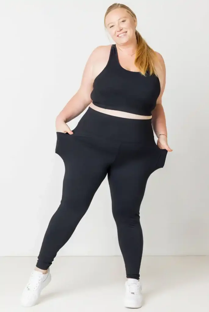 16 Best Workout Leggings for Plus Size Women Over 50 (2025) 20 Model wearing Superfit Hero Superhold Pocket Leggings. Best leggings for plus size women with thick thighs