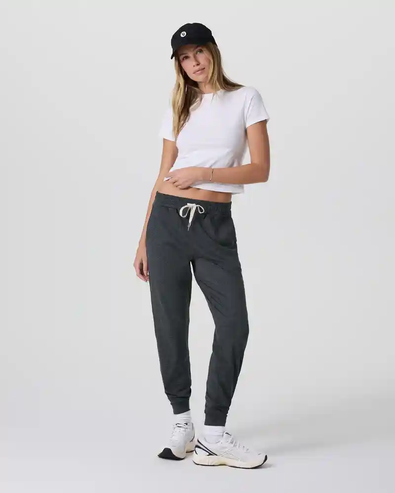 16 Best Workout Leggings for Plus Size Women Over 50 (2025) 19 Model wearing Vuori Performance Jogger. Squat proof leggings for plus size