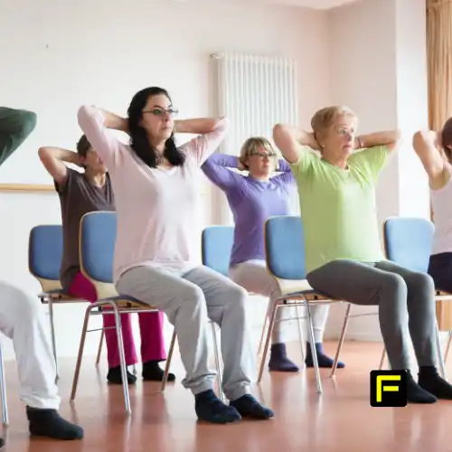 5 Best Low Impact Exercises for Seniors to Stay Active and Strong 2 Seated march training for seniors to build heart and cardio strength, core stability.